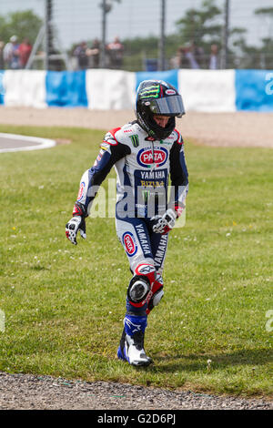 Donington Park,  UK. 28th May, 2016. Cameron Beaubier walking away after his first lap crash at Goddards corner Credit:  steven roe/Alamy Live News Stock Photo