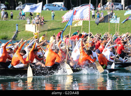 Zagreb, Croatia. 28th May, 2016. Rowing teams compete during Neretva boat race at Jarun Lake, in Zagreb, capital of Croatia, May 28, 2016. A dozen of rowing crews who participated in the traditional Boat Marathon competed in Zagreb on Saturday. © Miso Lisanin/Xinhua/Alamy Live News Stock Photo