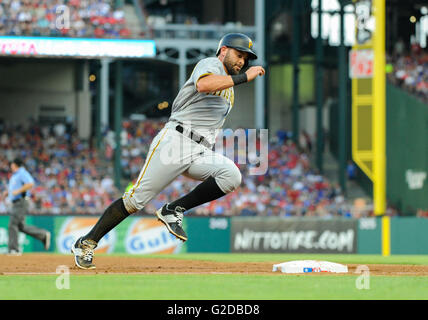 Pittsburgh Pirates Francisco Cervelli (29) and home plate umpire DJ  Reyburn, left, react after both being hit by a pitch as Toronto Blue Jays  catcher Dioner Navarro, centre, looks to help during