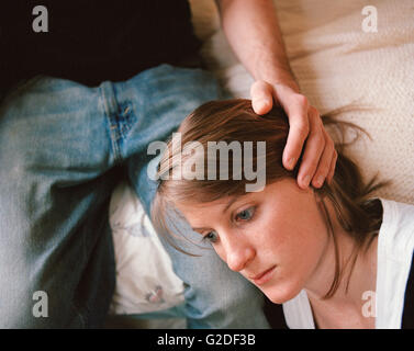 Man Comforting Sad Woman, Close Up Stock Photo