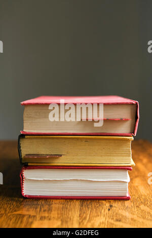 Three Stacked Hardcover Books Stock Photo