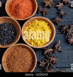 Colorful spice for food, with natural color and make aromatic flavor, cashew, chilli, pepper, turmeric powder, star anise Stock Photo