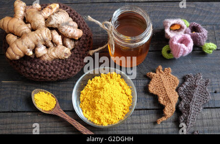 Turmeric powder with bee honey, agriculture product, nutrition, healthy food, natural cosmetic, beauty care,treat stomach ache Stock Photo