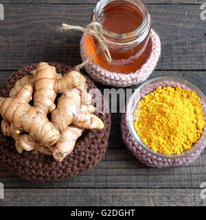 Turmeric powder with bee honey, agriculture product, nutrition, healthy food, natural cosmetic, beauty care,treat stomach ache Stock Photo