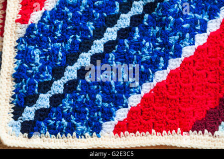 detail of colourful crocheted blanket - crochet blanket detail close up Stock Photo