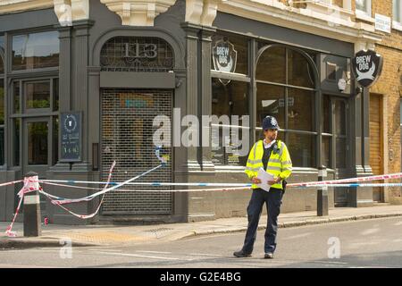 Police cordon off Greenland Road in Camden, north London, following the fatal stabbing of a man believed to be in his 30s, in the early hours of Sunday morning. Stock Photo