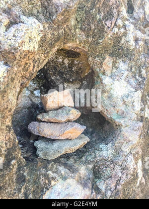 pile of rocks in a rock crevice Stock Photo