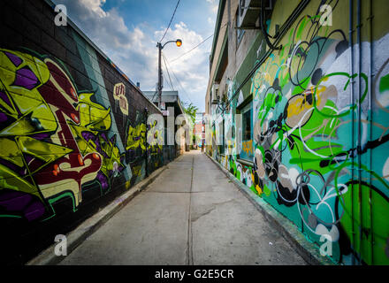 Graffiti in an alley in Kensington Market, Toronto, Ontario. Stock Photo