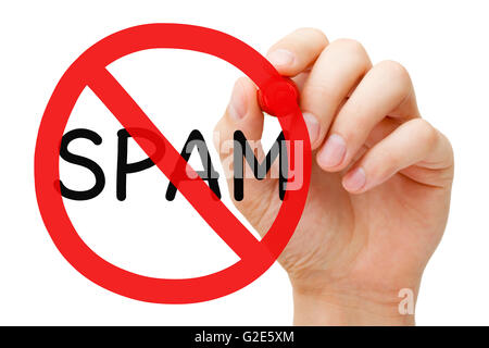 Hand drawing Spam prohibition sign concept with marker on transparent wipe board. Stock Photo