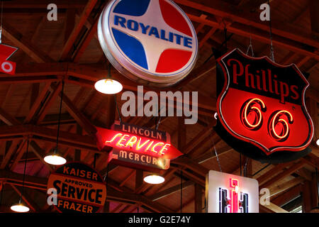 Ccanopy signs of varying automobile themes in Heritage Park, Alberta, Canada Stock Photo