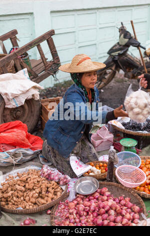 Woman selling vegetables, fruits and other food, in a market, Myanmar, Burma, Southeast Asia, Asia