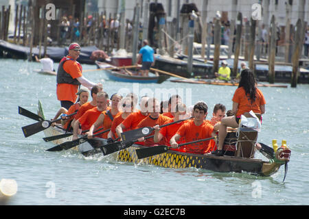 May 15, 2016 - Venice, Italy - Rowers from many countries participate in the 42nd Vogalonga regatta on the Grand Canal near the the Basilica della Salute in Venice, Italy on Sunday, May 15, 2016.  The Vogalonga, a non-competitive recreational sporting event for amateur athletes, is part of the annual â€œVenice International Dragon Boat Festival.''  The Grand Canal is closed to motor-driven boats during the event..Credit: Ron Sachs / CNP (Credit Image: © Ron Sachs/CNP via ZUMA Wire) Stock Photo