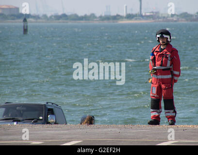 Southampton, Hampshire, UK. 29th May, 2016. A Child has been airlifted to hospital by the Hampshire and Isle of Wight Air Ambulance following a high-speed collision just off Calshot Spit in the Solent. The incident happened just after 2pm this afternoon( Sunday). A joint operation involving the Air ambulance, Coastguard rescue teams from Southampton, South Central ambulance and Two Lifeboats crews from Gosport and Calshot. The lifeboat from Gosport who was out on the water went to rescue two children and two adults who were on jet ski that collided on the water. Credit:  uknip/Alamy Live News Stock Photo