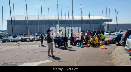 Southampton, Hampshire, UK. 29th May, 2016. A Child has been airlifted to hospital by the Hampshire and Isle of Wight Air Ambulance following a high-speed collision just off Calshot Spit in the Solent. The incident happened just after 2pm this afternoon( Sunday). A joint operation involving the Air ambulance, Coastguard rescue teams from Southampton, South Central ambulance and Two Lifeboats crews from Gosport and Calshot. The lifeboat from Gosport who was out on the water went to rescue two children and two adults who were on jet ski that collided on the water. Credit:  uknip/Alamy Live News Stock Photo