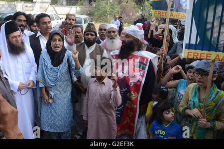 Pakistani activists of 'Afia movement' and civil society hold placards during demonstration to free the arrested Dr Afia Siddiqui from the New York prison, in Lahore. Afia Siddiqui born 2 March 1972 is a MIT trained Pakistani neuroscience, who was convicted on two counts of attempted murder of US nationals, officers, and employees, assault with a deadly weapon, carrying and using a firearm, and three counts of assault on US officers and employees. She is currently serving her 86 year sentence at the Federal Medical Center, Carswell in Fort Worth, Texas. (Photo by Rana Sajid Hussain/Pacific Pre Stock Photo