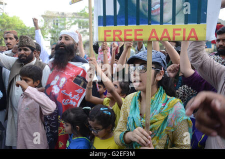 Pakistani activists of 'Afia movement' and civil society hold placards during demonstration to free the arrested Dr Afia Siddiqui from the New York prison, in Lahore. Afia Siddiqui born 2 March 1972 is a MIT trained Pakistani neuroscience, who was convicted on two counts of attempted murder of US nationals, officers, and employees, assault with a deadly weapon, carrying and using a firearm, and three counts of assault on US officers and employees. She is currently serving her 86 year sentence at the Federal Medical Center, Carswell in Fort Worth, Texas. (Photo by Rana Sajid Hussain/Pacific Pre Stock Photo