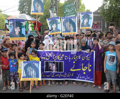 Pakistani activists of 'Afia movement' and civil society hold placards during demonstration to free the arrested Dr Afia Siddiqui from the New York prison, in Lahore. Afia Siddiqui born 2 March 1972 is a MIT trained Pakistani neuroscience, who was convicted on two counts of attempted murder of US nationals, officers, and employees, assault with a deadly weapon, carrying and using a firearm, and three counts of assault on US officers and employees. She is currently serving her 86 year sentence at the Federal Medical Center, Carswell in Fort Worth, Texas. (Photo by Rana Sajid Hussain/Pacific Pre Stock Photo