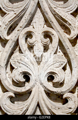 Floral bas relief around a church door Stock Photo