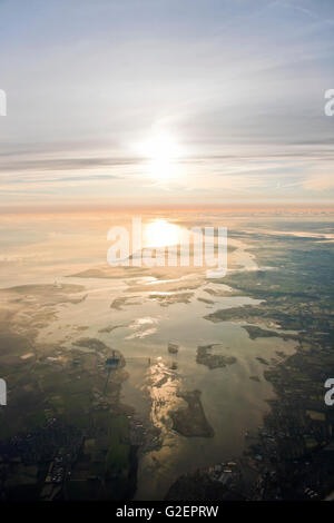 Vertical aerial view of the Isle of Sheppey and Thames estuary across the Kent countryside. Stock Photo