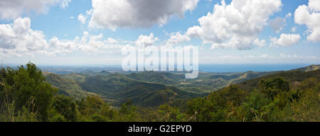 Horizontal panoramic (3 picture stitch) aerial view of Topes de Collantes National Park in Cuba. Stock Photo