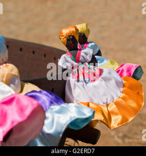 Square view of black ethnic handmade dolls for sale in Valle De Los Ingenios, Cuba. Stock Photo