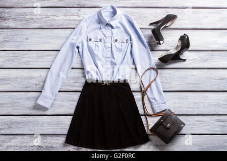 Light blue shirt and heels. Stock Photo