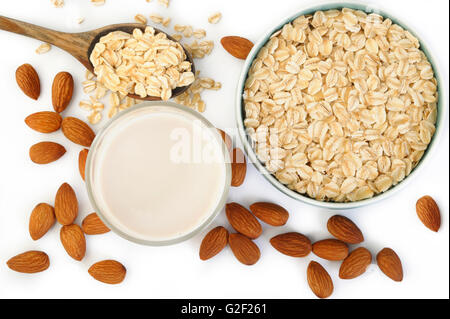 almond milk in glass with oats Stock Photo
