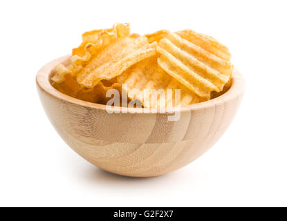 Crinkle cut potato chips isolated on white background. Tasty spicy potato chips in bowl. Stock Photo