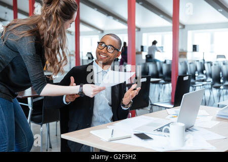 Business managers working with new startup in the office Stock Photo
