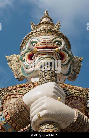 Close up of statue of giant Yaksha demon guarding gates of Grand Palace, Bangkok, Thailand Stock Photo