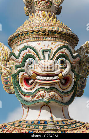 Close up of statue of giant Yaksha demon guarding gates of Grand Palace, Bangkok, Thailand Stock Photo