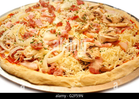 Raw Pizza Ready for the Oven Stock Photo