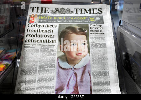 Princess Charlotte on her first birthday photo taken by her mother on front page of The Times newspaper in a supermarket in London England UK
