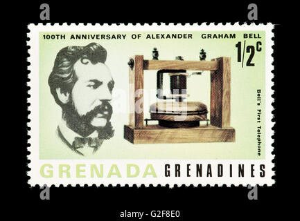 Postage stamp from Grenada Grenadines Depicting Alexander Graham Bell and his first phone. Stock Photo
