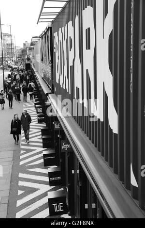 Boxpark in trendy Shoreditch, east London, a shipping container pop-up mall, with fashion and lifestyle shops and cafes, UK Stock Photo