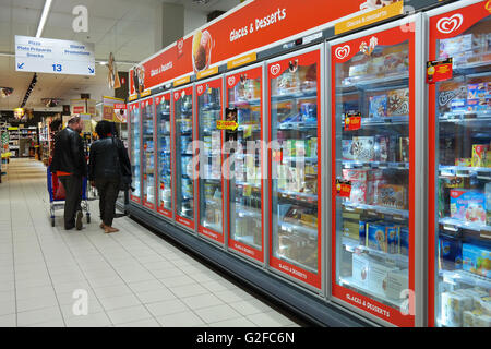 Freezer department with Ice cream of Unilever Heartbrand in a Carrefour Hypermarket. Stock Photo