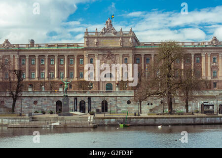 View of the Royal Palace in Stockholm, Sweden with the Medieval Museum (Medeltidsmuseet) in front Stock Photo