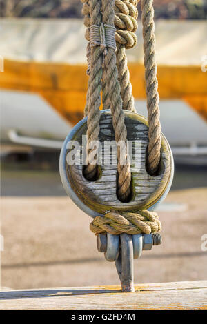 Blocks and tackles on a sailing vessel Stock Photo