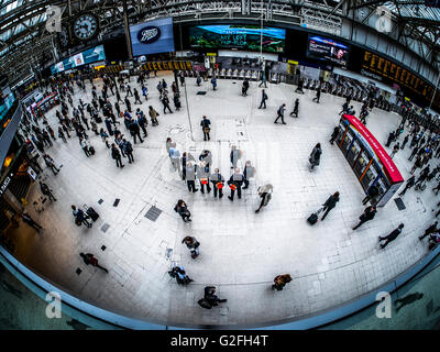 Commuters at Waterloo Station, London, taken with Fish-eye lens Stock Photo