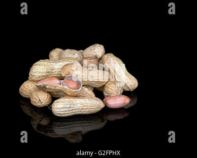 Mnkey nuts aka groundnuts aka peanuts. Healthy snack, with copy space. Stock Photo