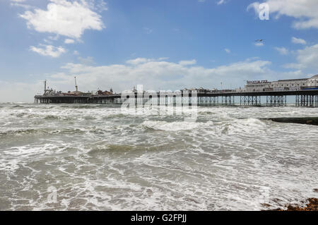 View of rough sea and Brighton pier on a windy day, United Kingdom Stock Photo