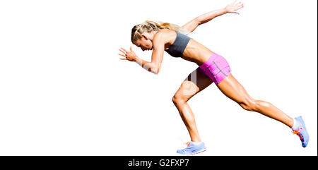 Sporty woman running on a white background Stock Photo