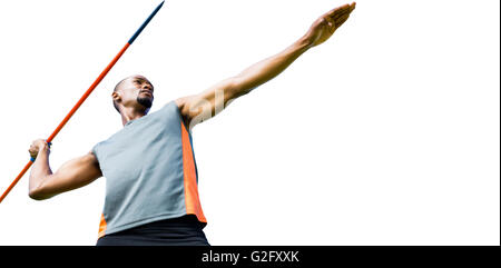 Low angle view of sportsman practising javelin throw Stock Photo