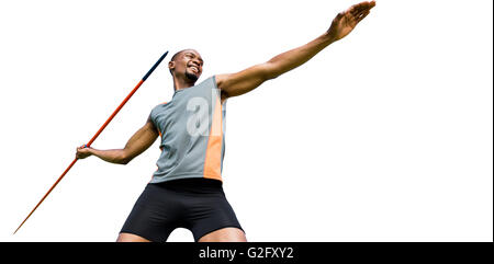 Low angle view of sportsman practising javelin throw Stock Photo