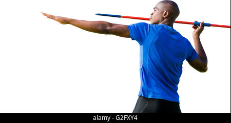 Profile view of sportsman practising javelin throw Stock Photo