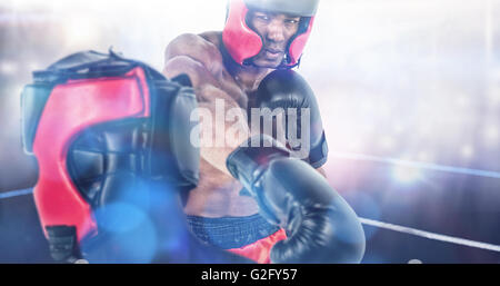 Composite image of rear view of boxer standing Stock Photo