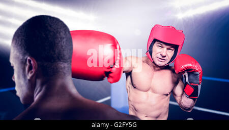 Composite image of rear view of boxer standing Stock Photo