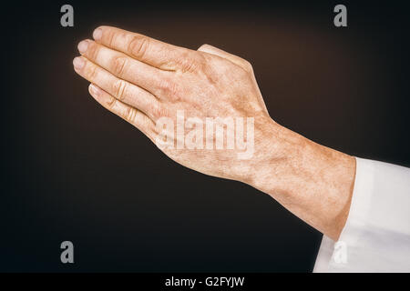 Composite image of karate player making hand gesture on white background Stock Photo