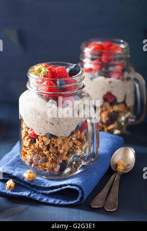 homemade granola and chia seed pudding with berry healthy breakfast Stock Photo