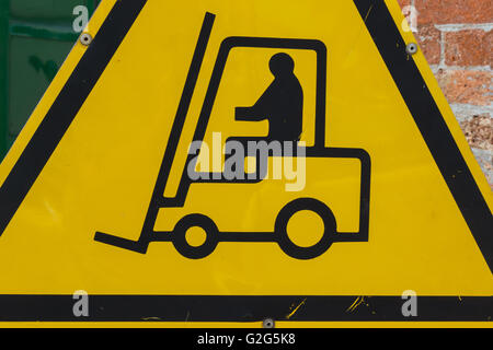 Yellow Fork Lift Truck Operating Warning Sign, Transportation Concept Stock Photo